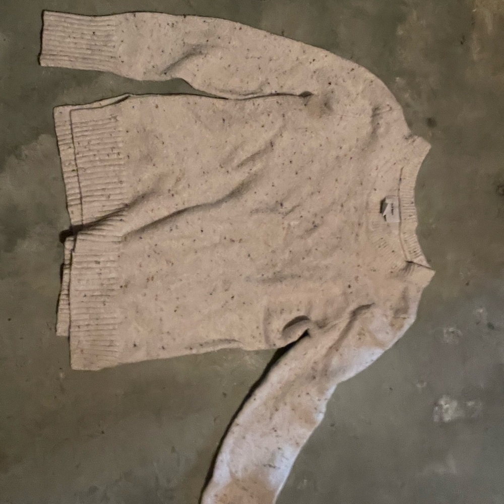 It’s a sweet sweater, slits on the side that go mid-rib